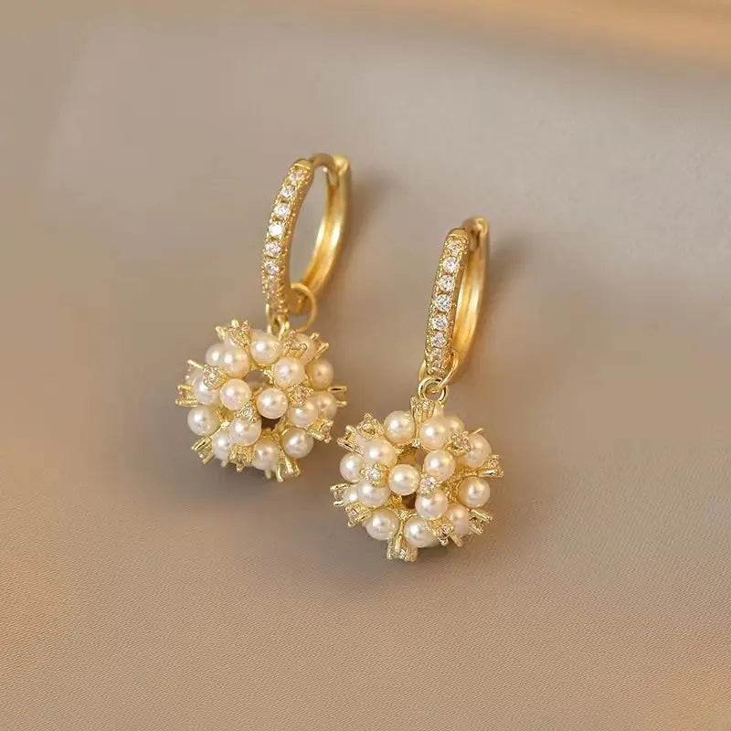 1 Pair of Golden-Tone Hoop Earrings with Shimmering Faux Freshwater Pearl Cluster