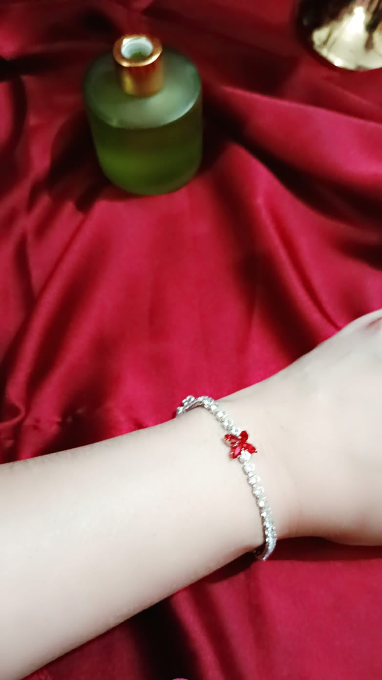 Silvery Bracelet with 4 leaf Red Charm & Full Zircon Detailing