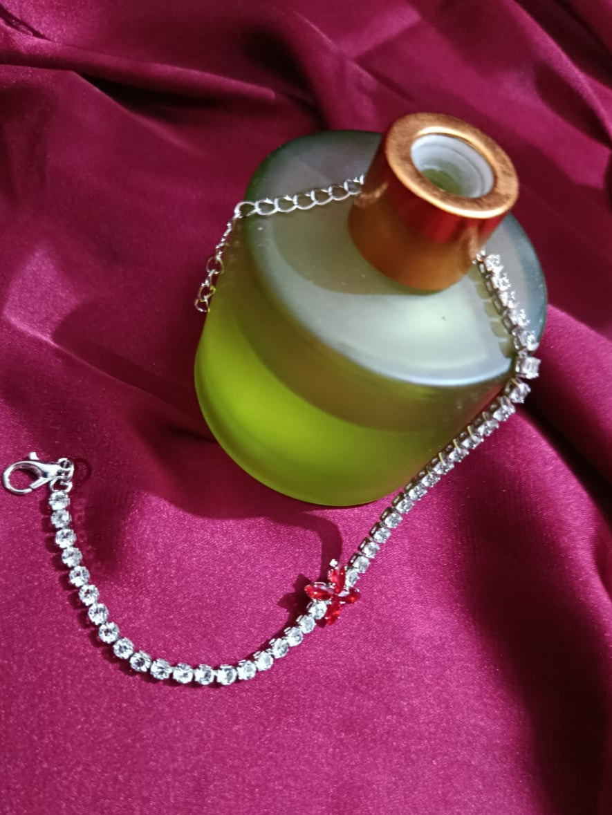 Silvery Bracelet with 4 leaf Red Charm & Full Zircon Detailing